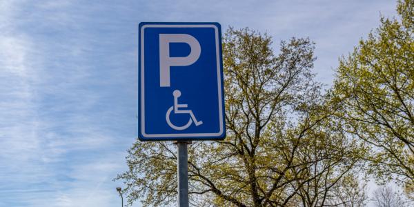 Public parking sign for persons with disabilities.